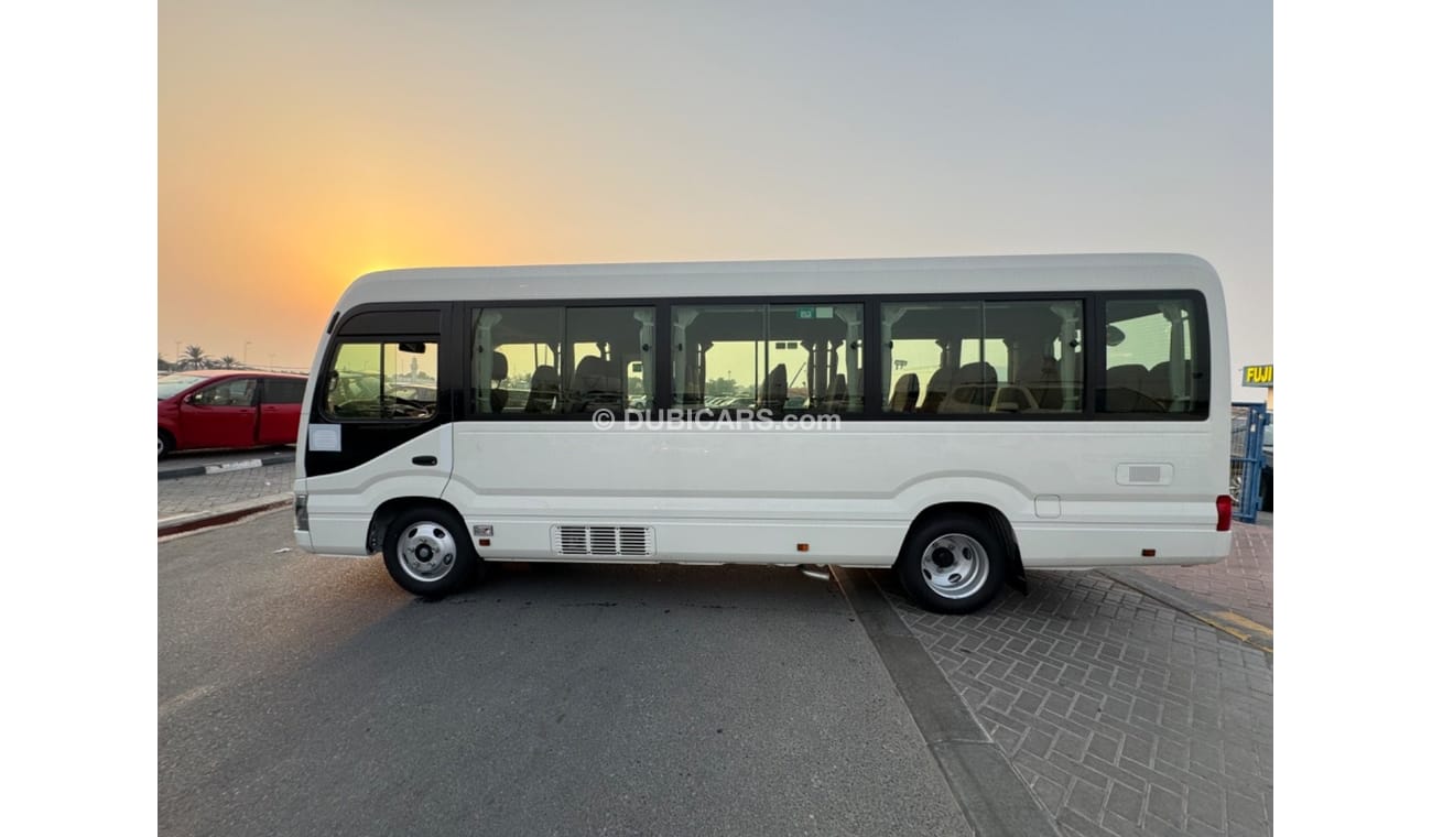 Toyota Coaster 2024 TOYOTA COSTER 4.0L DIESEL WITH COOLBOX, LUGGAGE RACK, CURTAINS, 22 SEATS MT