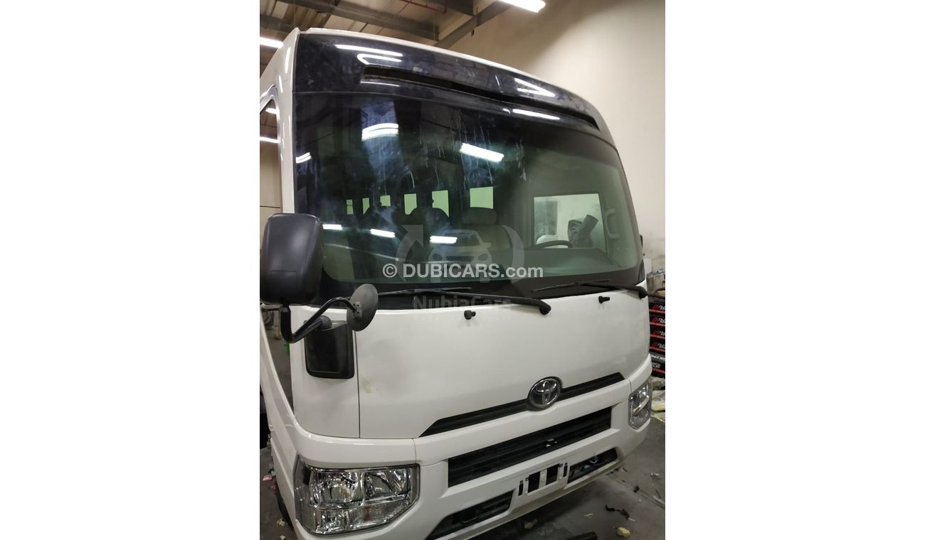 تويوتا كوستر B6-Level Armored 2024 Toyota Coaster 23-Seater High-Roof 4.2L 6-Cyl Diesel M/T RWD Export Only