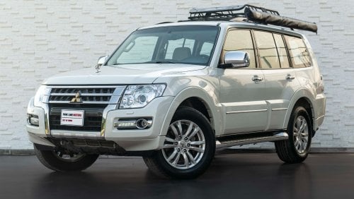 ميتسوبيشي باجيرو AED 1,415 PM • 3.8L PAJERO GLS TOP • ONLY 60,000 KMS • GOLD EMBLEM PACKAGE WITH RHINO ROOF-RACK