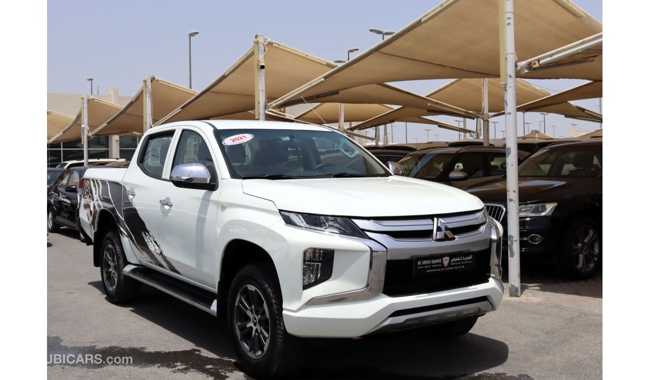 Mitsubishi L200 GLX ACCIDENTS FREE - GCC - 4WD - ORIGINAL PAINT - FULL OPTION - CAR IS IN PERFECT CONDITION INSIDE O