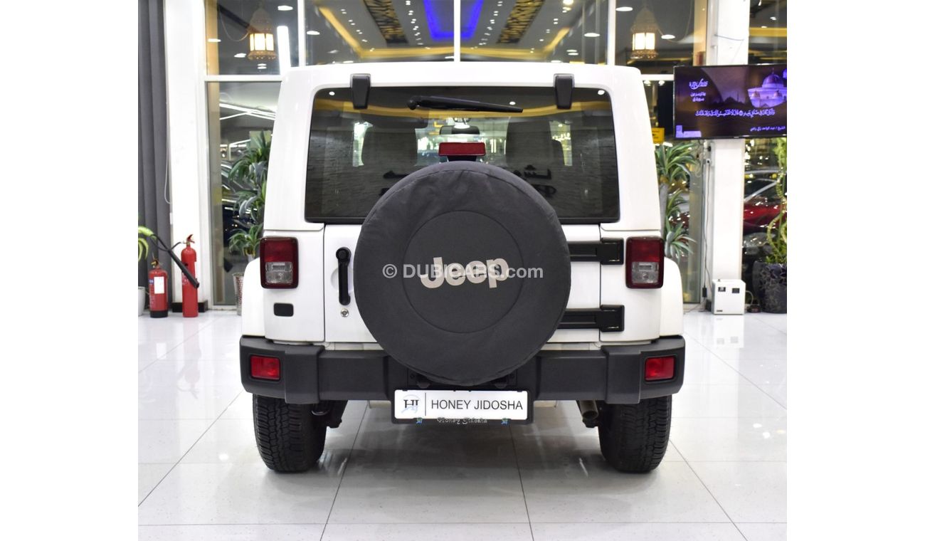 Jeep Wrangler EXCELLENT DEAL for our Jeep Wrangler Sahara ( 2014 Model ) in White Color GCC Specs