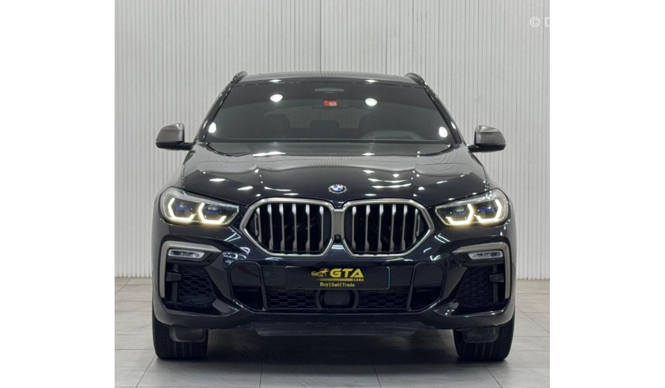 بي أم دبليو X6 50i Exclusive 4.4L 2021 BMW X6 M50i, 2026 AGMC Agency Warranty + Service Package, Full Service Histo