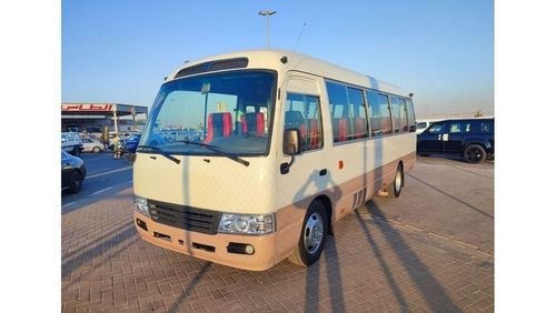 Toyota Coaster JTGFP518504500593 || TOYOTA COASTER (BUS) | || DIESEL || LHD || MANUAL