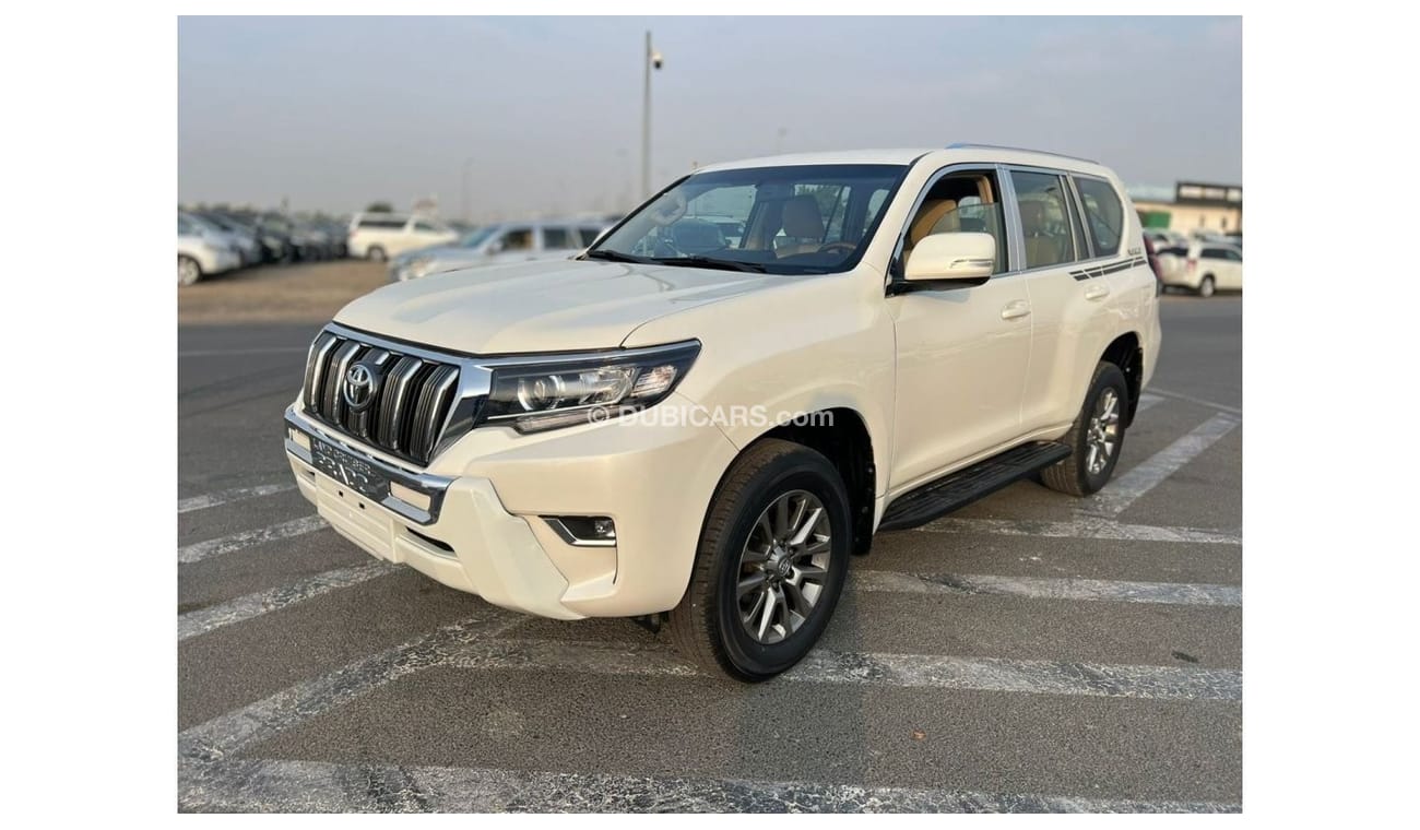 تويوتا برادو 2010 Toyota Prado TXL 4.0L V6 - 2023 Modification - 7 Seater With Cool Box Push Start - UAE PASS