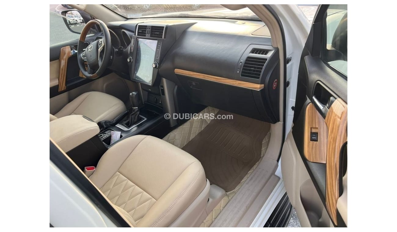 تويوتا برادو 2010 Toyota Prado TXL 4.0L V6 - 2023 Modification - 7 Seater With Cool Box Push Start - UAE PASS