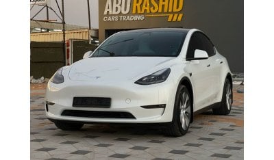 Tesla Model Y TESLA MODEL Y LONG RANGE DUAL MOTOR MODEL : 2023 MILEAGE : 24,000 km PRICE : 172,000 DIRHAMS Gulf sp