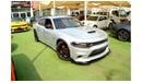 Dodge Charger R/T The Charger RT is powered by a 5.7-liter HEMI V8 engine that produces 370 horsepower and 535 Nm