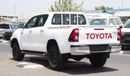 Toyota Hilux 2.4L diesel  . White 2023 model, M/T Wide body with Chrome bumper