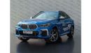 BMW X6 AED 4,325 PM • X6 M50i • 4.4L TURBOCHARGED V8 • LOW KM • OFFICIAL BMW WARRANTY + SERVICE PLAN UNTIL