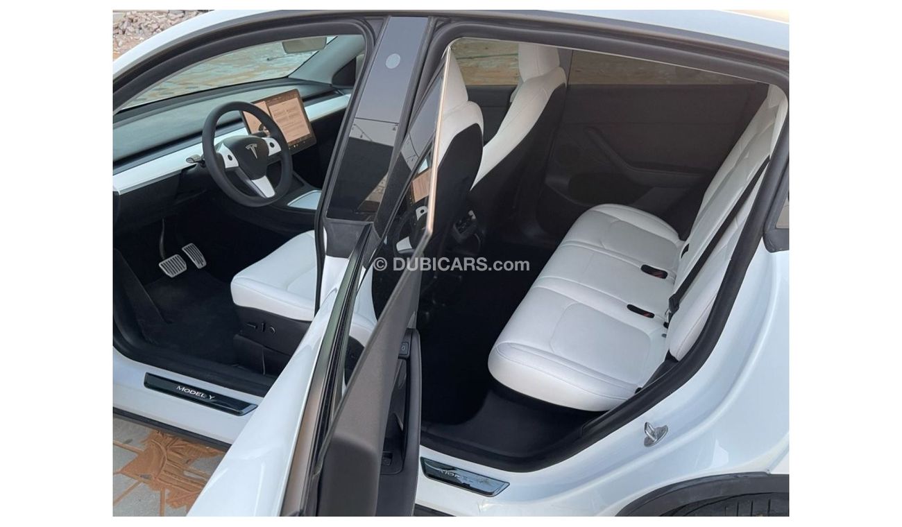 Tesla Model Y TESLA MODEL Y LONG RANGE DUAL MOTOR MODEL : 2023 MILEAGE : 24,000 km PRICE : 172,000 DIRHAMS Gulf sp