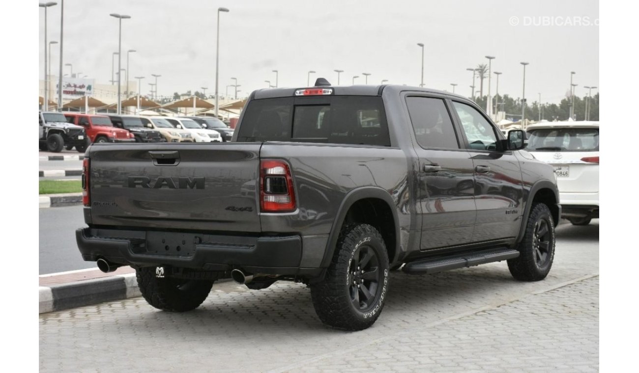 رام 1500 V-8 REBEL V-8 (CLEAN CAR WITH WARRINTY)