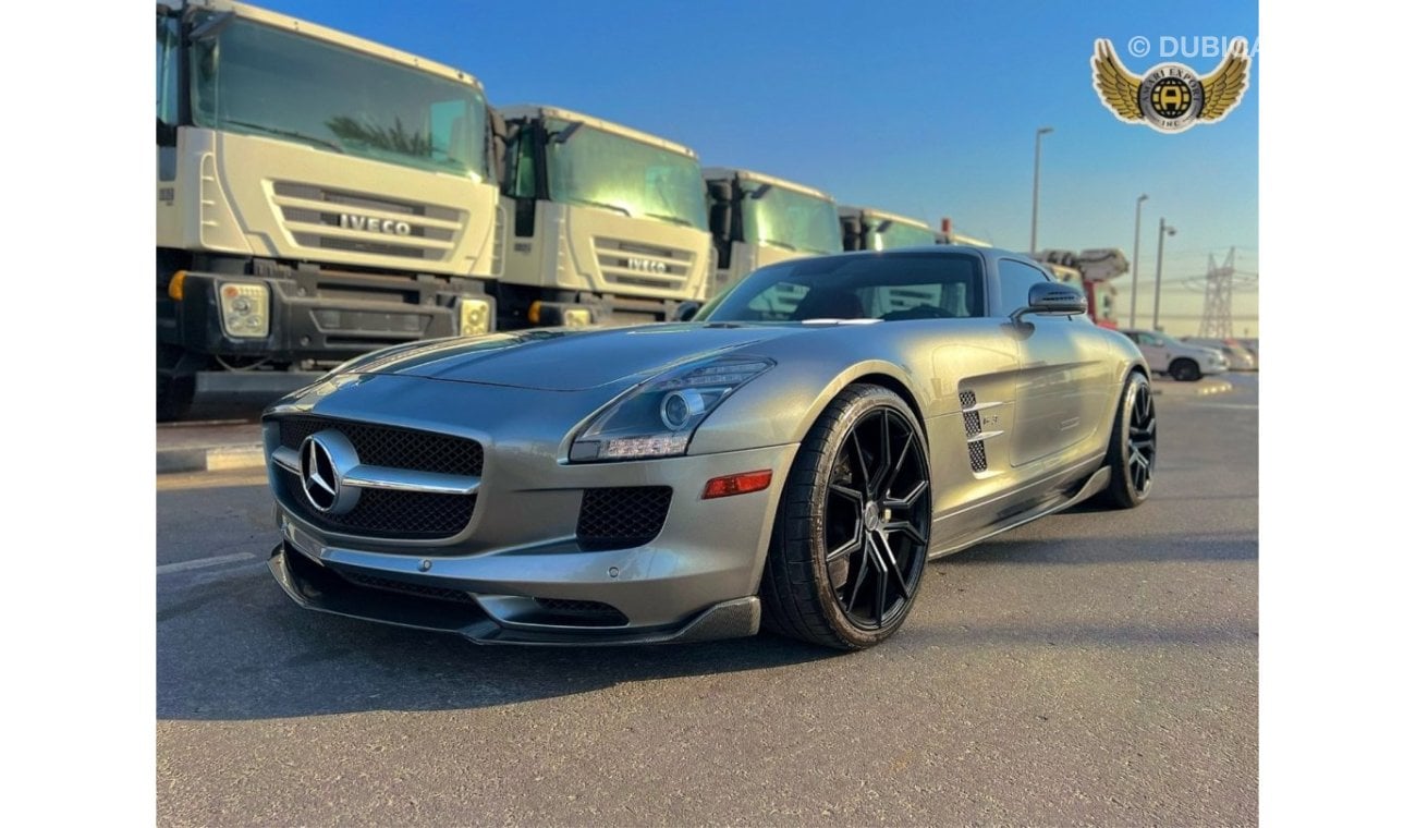 Mercedes-Benz SLS AMG Description For Sale: 2011 Mercedes-Benz SLS AMG Mileage: 21,000 km Exterior: Silver Interior: Red F