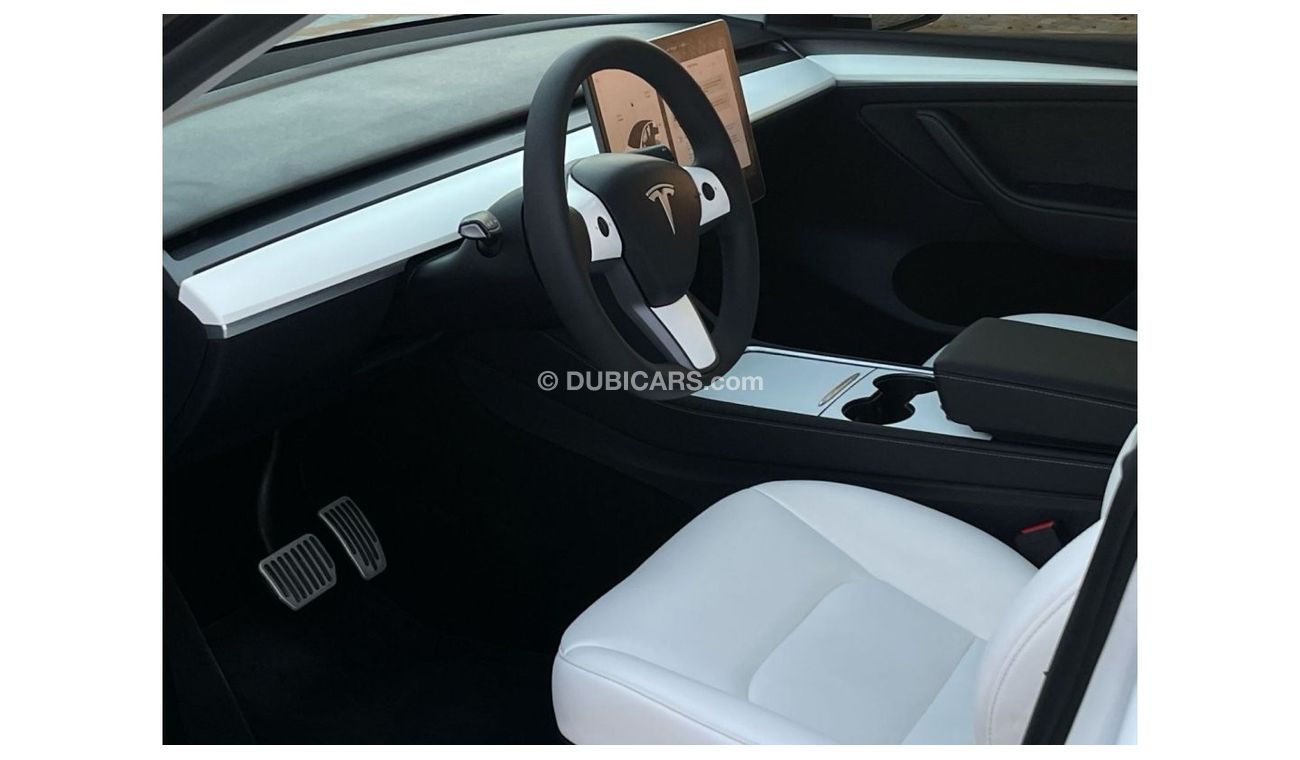 Tesla Model Y TESLA MODEL Y LONG RANGE DUAL MOTOR MODEL : 2023 MILEAGE : 24,000 km PRICE : 172,000 DIRHAMS Gulf sp