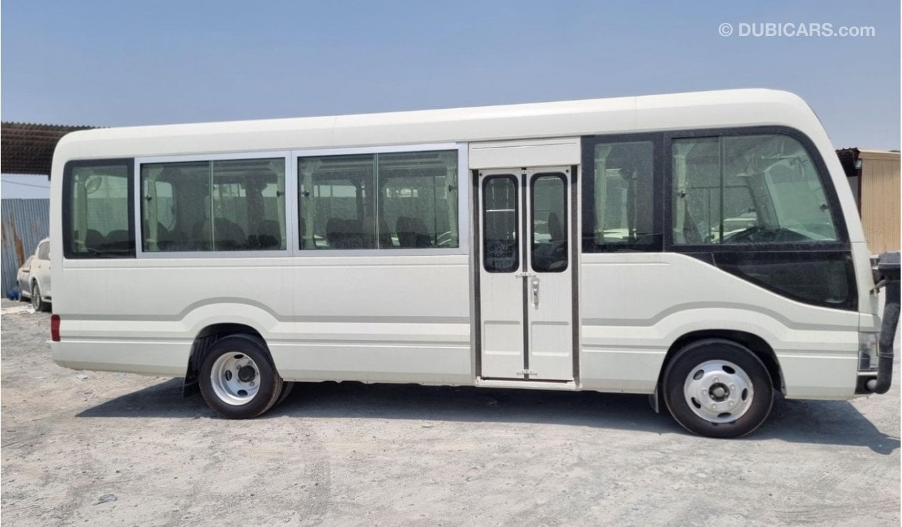 تويوتا كوستر 2024 Toyota Coaster High-Roof 30-Seater Snorkel 4.2L 6-Cyl Diesel M/T RWD (Africa only)