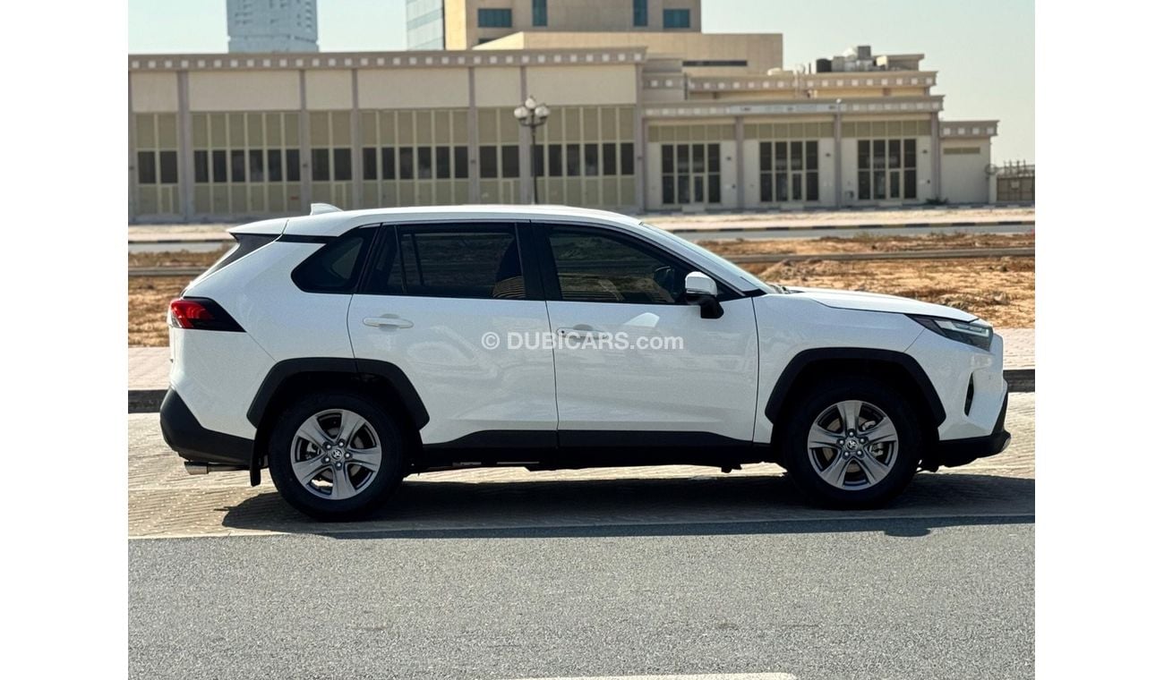 Toyota RAV4 Toyota RAV4 2024 Hybrid – White 	•	Engine & Performance: 2.5L 4-cylinder hybrid engine paired with a