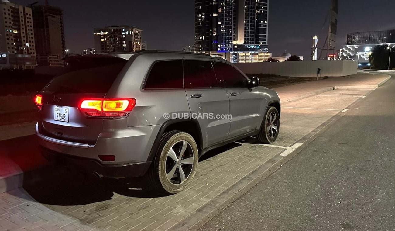 جيب شيروكي Jeep Grand Cherokee 3.6L V6 290HP USA specs clean title, full Option 2014 Model