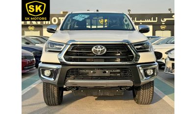 تويوتا هيلوكس SR5 / 2.7L V4 / M/T /  DVD + CAM / 4X4 / WOOD TRIM / FULL OPTION (CODE # 69026)