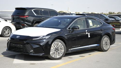 Toyota Camry LE 2.5L HEV With Wireless Charger   (Ready Car)