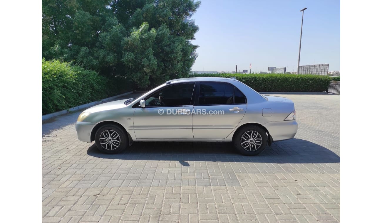 ميتسوبيشي لانسر Mitsubishi Lancer 2004 1.6 Gcc manual