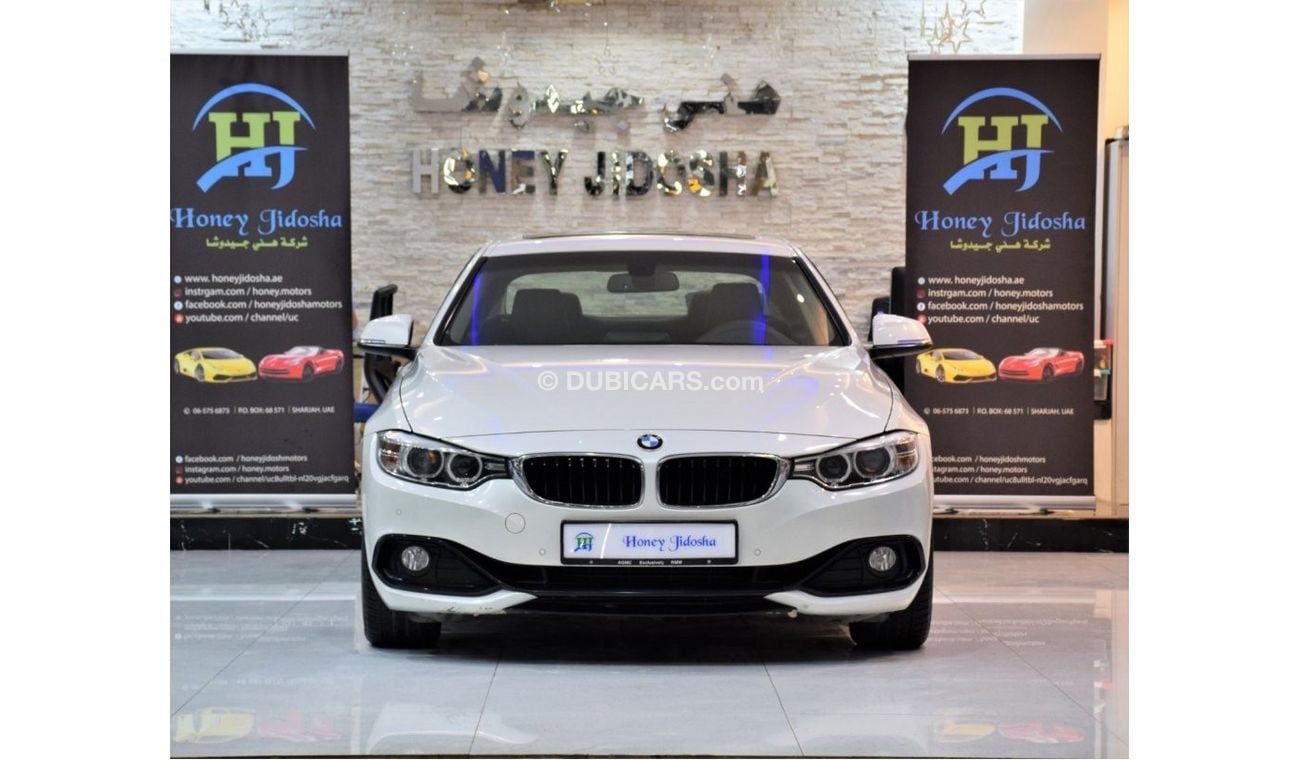 BMW 420i EXCELLENT DEAL for our BMW 420i Sport ( 435i Badge ) ( 2015 Model! ) in White Color! GCC Specs