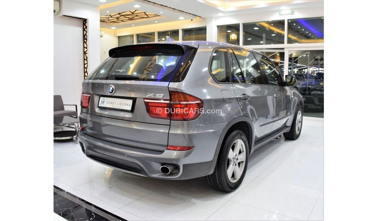 BMW X5 EXCELLENT DEAL for our BMW X5 xDrive35i ( 2011 Model! ) in Grey Color! GCC Specs