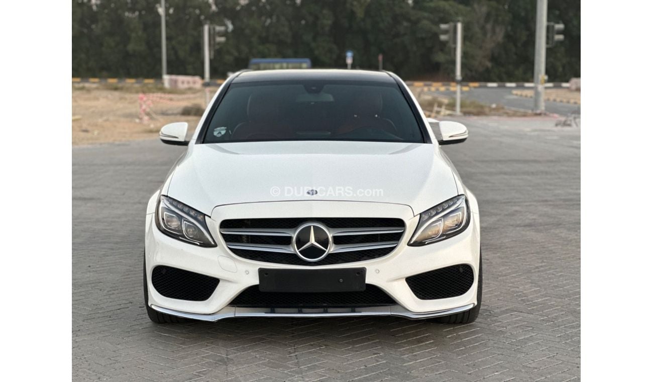 مرسيدس بنز C200 MODEL 2016 GCC CAR PERFECT CONDITION FULL OPTION PANORAMIC ROOF AMG