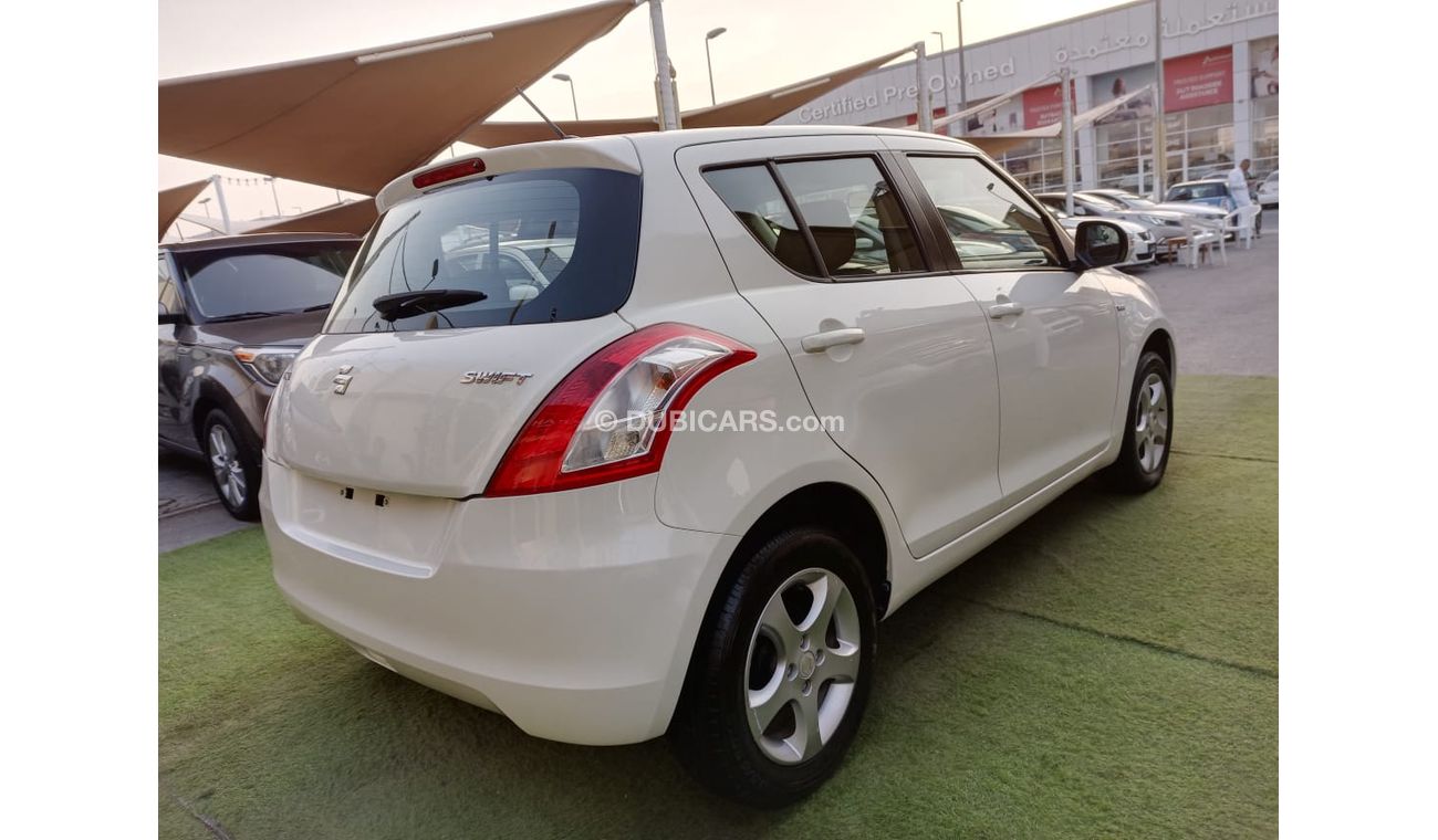 Suzuki Swift Gulf model 2014, center look, rims, air conditioning, without accidents, in excellent condition, you