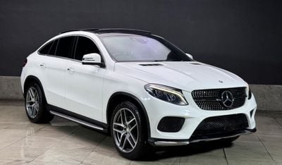 Mercedes-Benz GLE 350 The Mercedes-Benz GLE 350d Coupe in white is a stunning blend of luxury, power, and sporty design. H