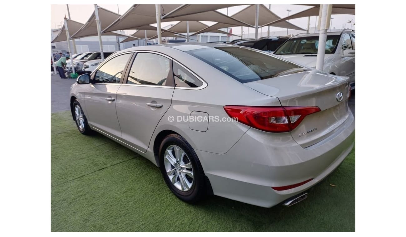 Hyundai Sonata 2016 Gulf model, cruise control, rear camera screen, front and rear air conditioning, alloy wheels i