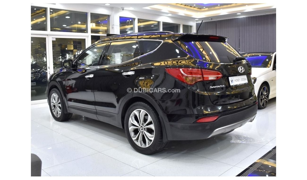 Hyundai Santa Fe EXCELLENT DEAL for our Hyundai SantaFe 4WD ( 2014 Model ) in Black Color GCC Specs