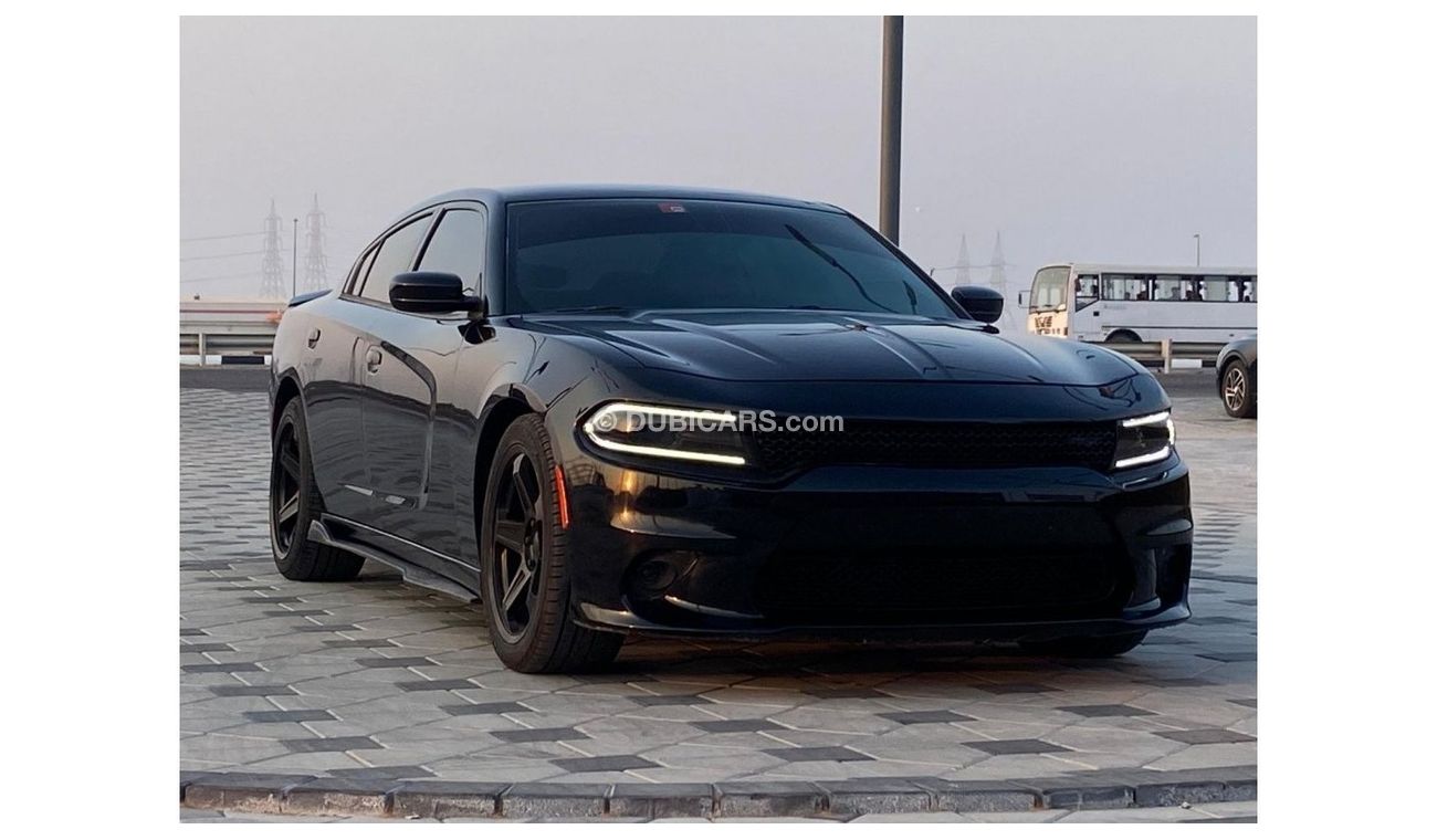 دودج تشارجر R/T سكات باك دودج تشارجر R/T  V8 5.7 HEMI موديل : 2016 السعر : 45.000 درهم  الممشي : 137.000 ك/م  37