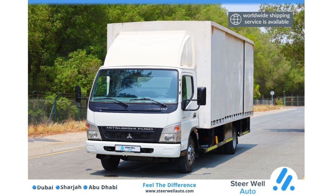 ميتسوبيشي كانتر Water Body Long Wheel Base with HD Sliding Door Box - Ready To Drive - GCC