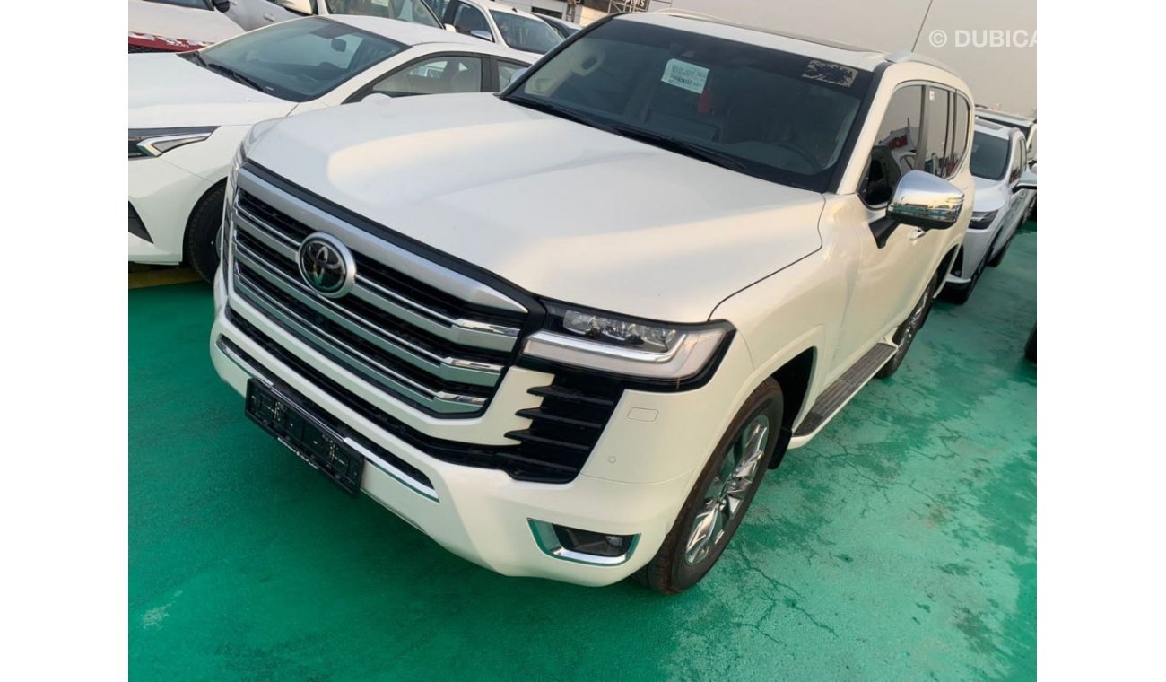 تويوتا لاند كروزر 2023 TOYOTA LAND CRUISER LC300 4.0L VXR WHITE - BEIGE AUTOMATIC FULL OPTION