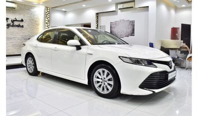 Toyota Camry EXCELLENT DEAL for our Toyota Camry LE Hybrid ( 2019 Model ) in White Color GCC Specs