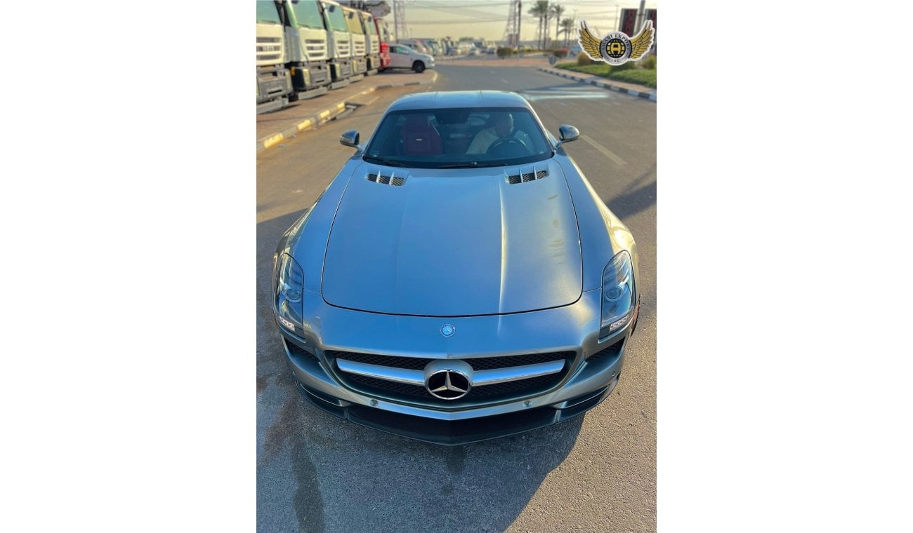 Mercedes-Benz SLS AMG Description For Sale: 2011 Mercedes-Benz SLS AMG Mileage: 21,000 km Exterior: Silver Interior: Red F