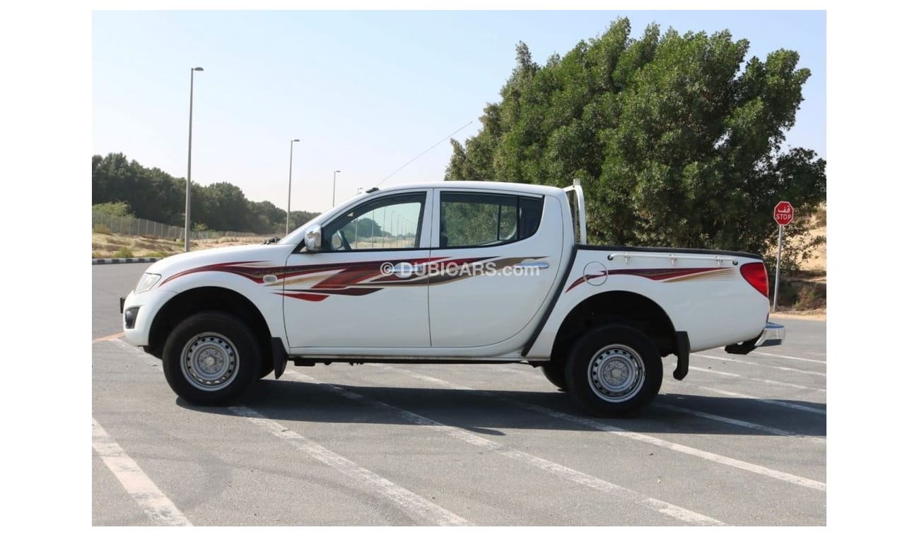 Mitsubishi L200 2015 |  L200 D/C 4X4 DIESEL MT WITH GCC SPECS AND EXCELLENT CONDITION