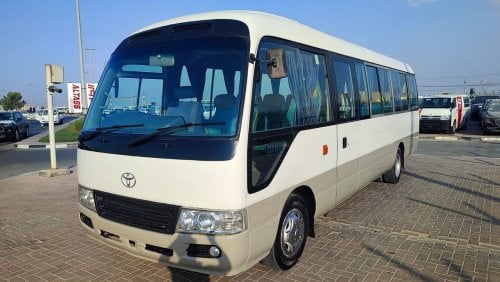 Toyota Coaster JTGEC538405000309 || 2008 WHITE GREY	4000	DIESEL	261785	RHD	MANUAL RIGHT HAND DRIVE.