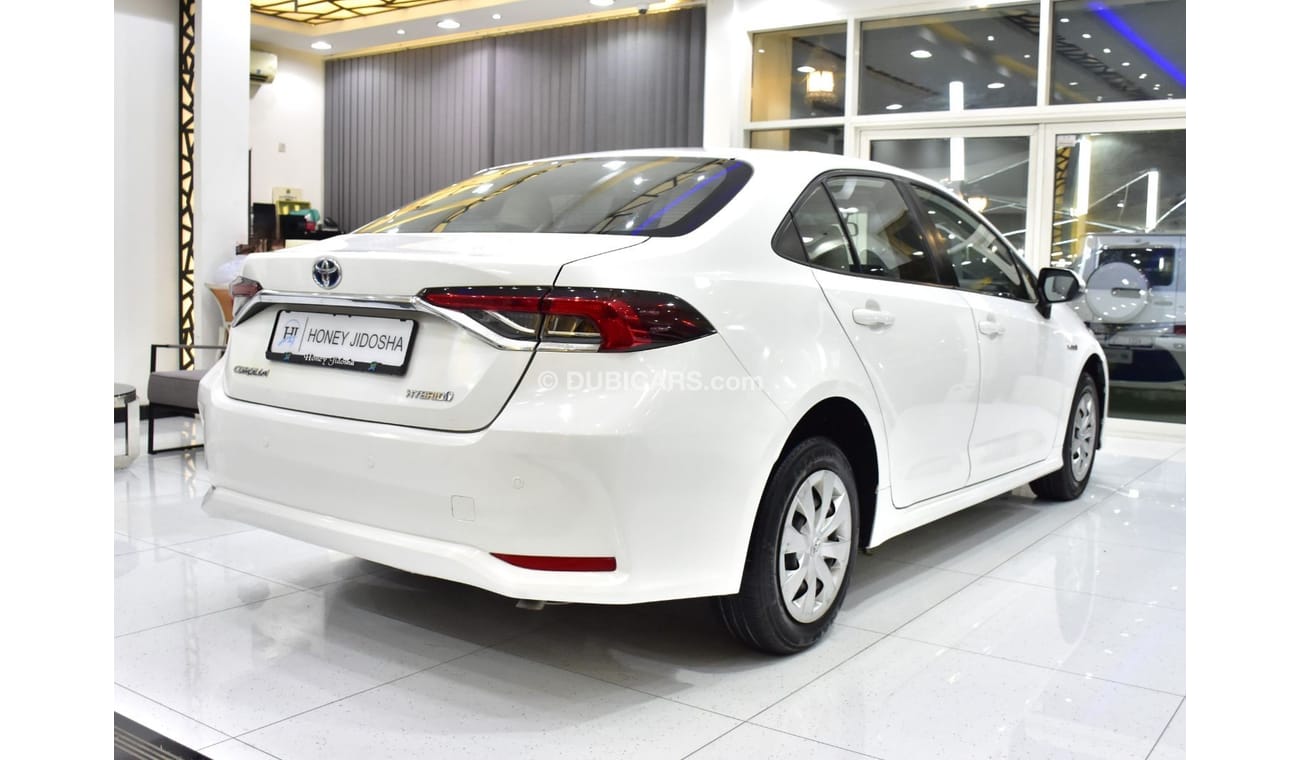 Toyota Corolla EXCELLENT DEAL for our Toyota Corolla Hybrid ( 2021 Model ) in White Color GCC Specs