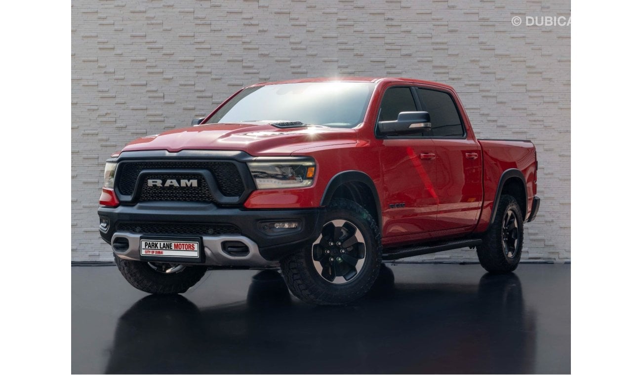 RAM 1500 AED 2,831 PM • RAM 1500 REBEL 5.7L HEMI® V8 • LOW KMS • OFFICIAL DODGE WARRANTY AND SERVICE CONTRACT