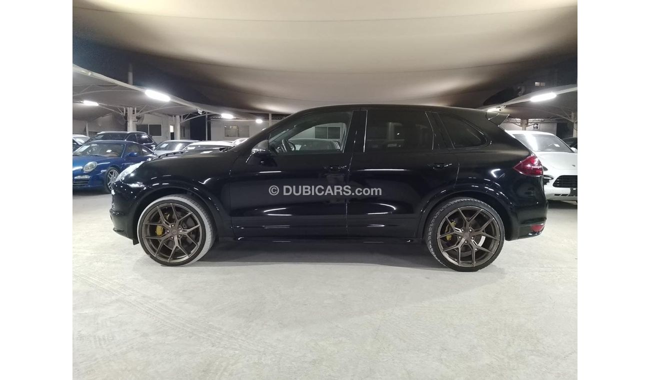 Porsche Cayenne Turbo 4.8L (500 HP) WITH MANSORY CARBON BONNET, MANSORY CARBON INTERIOR AND MORE..