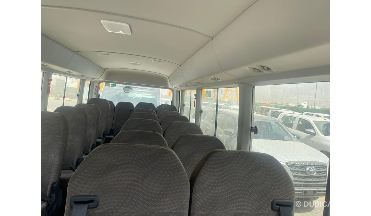 تويوتا كوستر 4.2L DIESEL 23 SEATER WITH AUTO DOOR AND 3-P SEATBELT M/T, 2024 MODEL