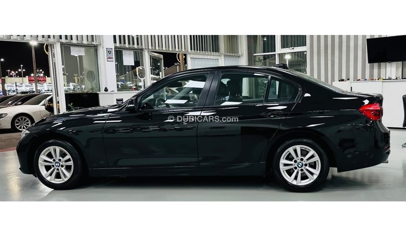 BMW 318i Executive GCC .. Low Milgea .. Perfect Condition .. Sunroof .