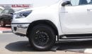 Toyota Hilux 2.4L diesel  . White 2023 model, M/T Wide body with Chrome bumper