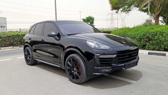 Porsche Cayenne красный черные диски