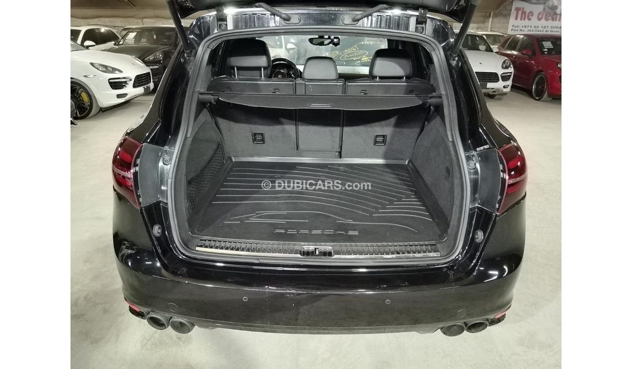 Porsche Cayenne Turbo 4.8L (500 HP) WITH MANSORY CARBON BONNET, MANSORY CARBON INTERIOR AND MORE..