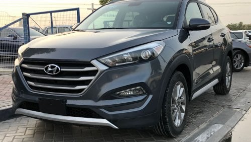 Hyundai Tucson 1.6LGDI TURBO/ POWER SEAT / DVD / (LOT # 2596)