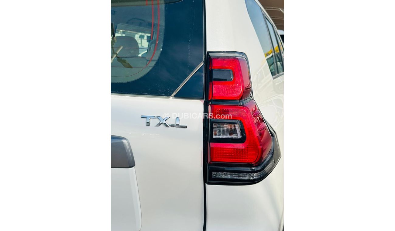 Toyota Prado TOYOTA PRADO TXL 4.0L PETROL - MID+/O - A/T - S/D- WHITE - 2023