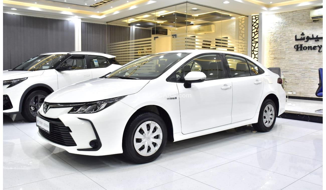 Toyota Corolla EXCELLENT DEAL for our Toyota Corolla Hybrid ( 2021 Model ) in White Color GCC Specs