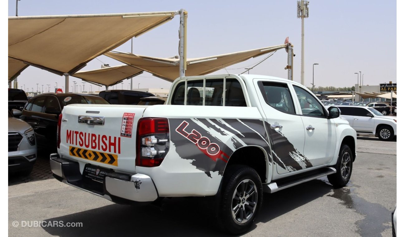 Mitsubishi L200 GLX ACCIDENTS FREE - GCC - 4WD - ORIGINAL PAINT - FULL OPTION - CAR IS IN PERFECT CONDITION INSIDE O