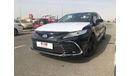 Toyota Camry TOYOTA_CAMERY_GRANDE_HYBRID_2023_BLACK_WHITE